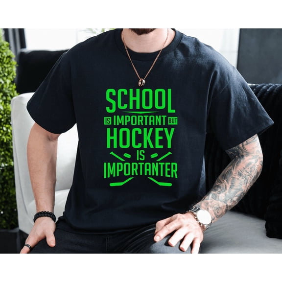 Hockey For Boys Player Sports Enthusiast Graphic Unisex T-Shirt, up to size 3XL.