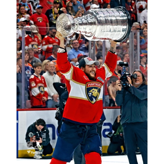 Brandon Montour Florida Panthers Unsigned 2024 Stanley Cup Champions Raising Cup Photograph