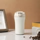 thumbnail image 1 of Taza de café portátil Taza de viaje aislada forrada de acero inoxidable | Termo a prueba de fugas de 600 ml | Vaso de bebidas frías y calientes | Acero 316 | Tapa abierta a presión | Negro Blanco, 1 of 6