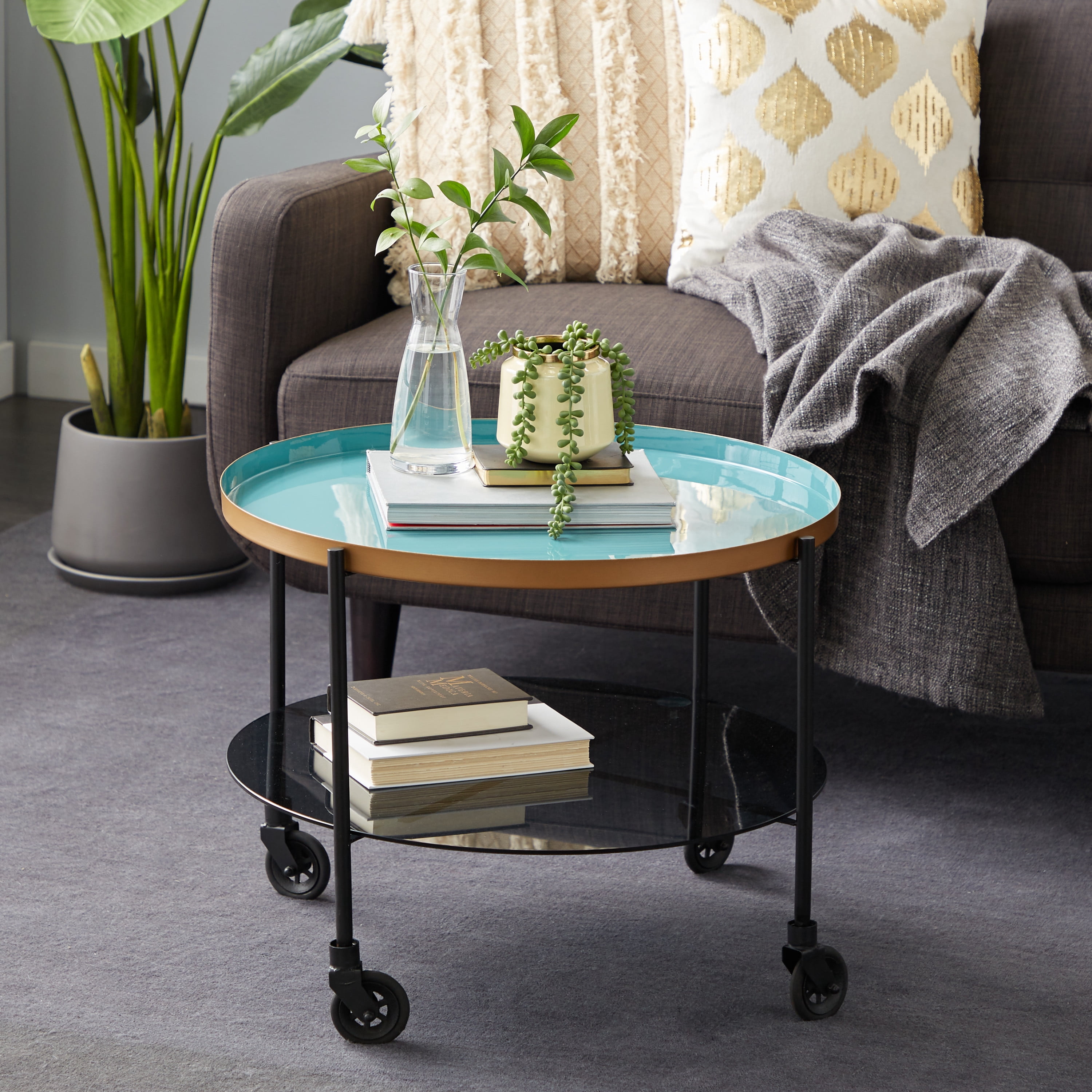 DecMode 18346 Round Black Metal Wheeled Coffee Table with Teal Enamel Tray Top and Tinted Glass Shelf, 26 in X 19 in