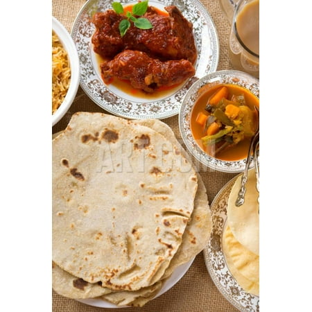 Chapatti Roti, Curry Chicken, Biryani Rice, Salad, Masala Milk Tea and Papadom. Indian Food on Dini Print Wall Art By
