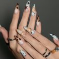 thumbnail image 1 of Uñas postizas adhesivas BABALAL largas estilo stiletto marrón con estampado de leopardo y estrella, 1 of 8