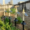 thumbnail image 4 of Yooshoverk Solar Candle Lights 4 Pack Flickering LED Garden Stake Path Lights Auto On/Off Waterproof Outdoor Decor, 4 of 9