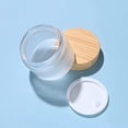 thumbnail image 1 of 50g Frosted Round Glass Jars with Wood Grain Lids - Perfect for Storing Lip and Body Scrubs, Lotions, and More!, 1 of 4
