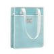 thumbnail image 1 of Bolsa Tote Popgear, Verde Aqua, Vertical con Asas Blancas, 1 of 4