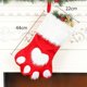 thumbnail image 3 of Delicias Navideñas: Calcetines Con Estampado De Perros Rojos Y Grises Árbol Festivo Y Bolsas Para Unas Felices Fiestas, 3 of 6