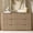 Natural Oak, variant on Hvoonc 54.5" Wide 6 Drawer Dresser for Bedroom with Faux Marble Top, Modern Curved-Corner Fluted Oak Storage Cabinet