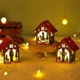 thumbnail image 2 of Casa de madera iluminada con soldados de nuez, decoración festiva y práctica para cualquier espacio. Ideal para crear un ambiente cálido y alegre. ¡Elige entre tres estilos únicos!, 2 of 6
