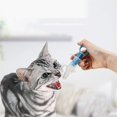 thumbnail image 2 of Jeringa de alimentación de plástico con tetina y vaso medidor para perros y gatos., 2 of 5