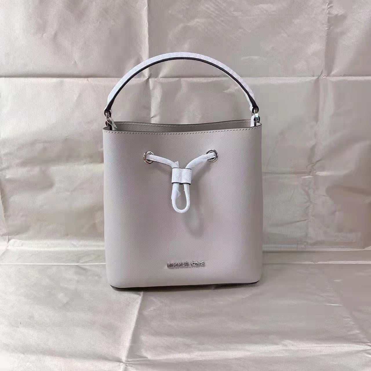 suri medium bucket crossbody