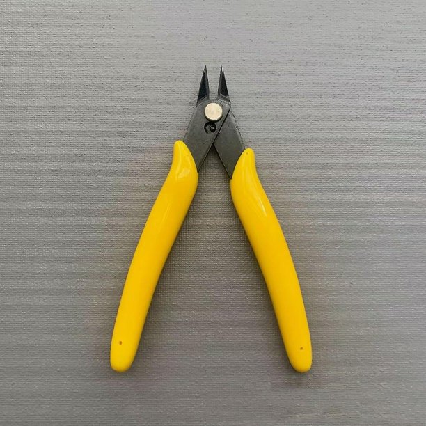 Clips reflectantes para pantalones de ciclismo (2 unidades, amarillo)