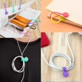 thumbnail image 3 of Enrolladores de cable con lazos de silicona reutilizables con imán fuerte para agrupar y organizar cables, cables de auriculares,llavero para colgar y sujetar (10 colores, paquete de 20) brillar Juguete, 3 of 3