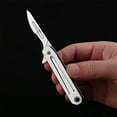 thumbnail image 1 of Huayishang Cutter Stainless Steel Quick Opening Utility No. 23 Folding Key Carry On, 1 of 5