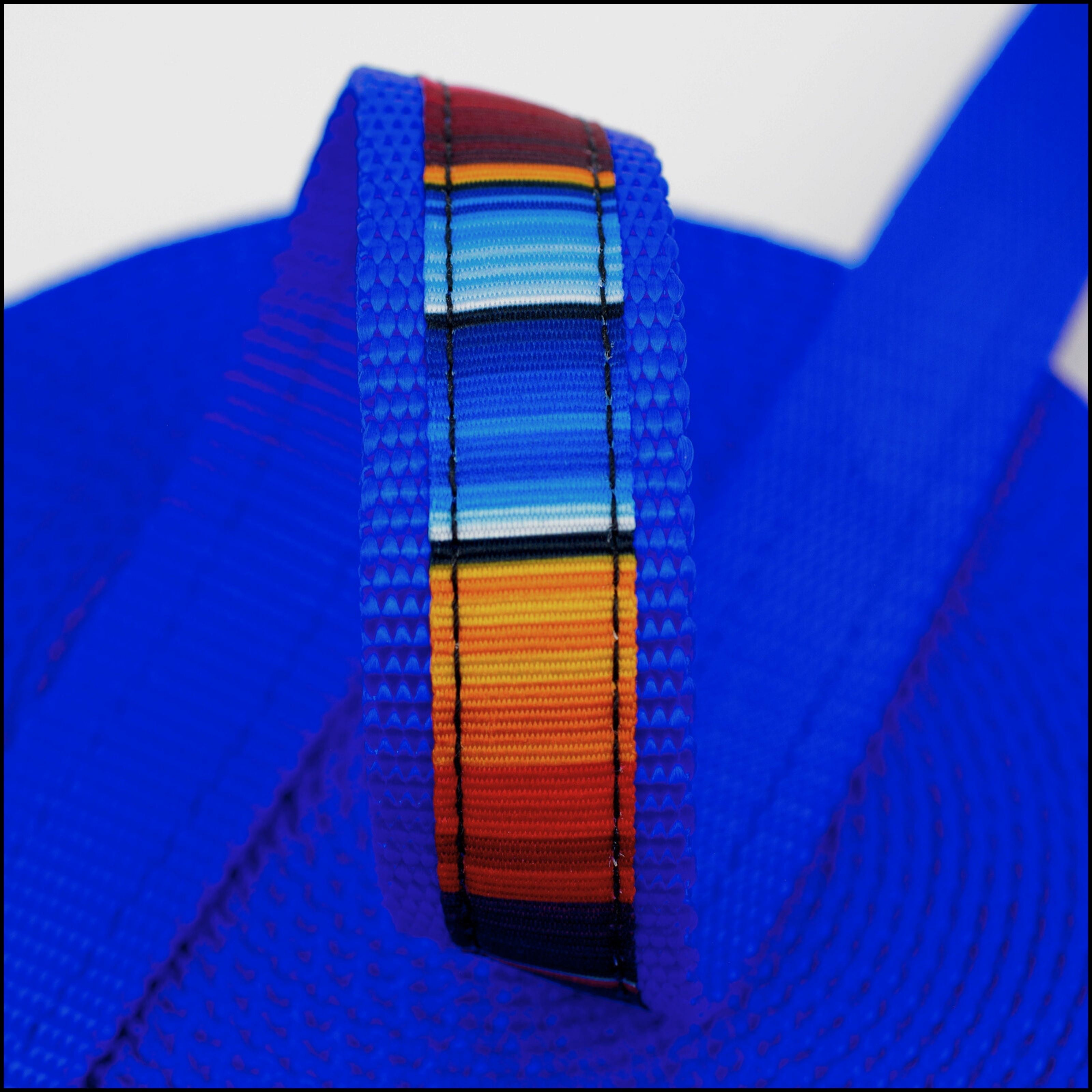 Country Brook Design® 5/8 inch Serape Ribbon on 1 inch Bright Royal Blue Nylon Webbing, 20 Yards