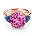 thumbnail image 2 of Gem Stone King 18K Rose Gold Plated Silver Pink Created Sapphire and Blue Created Sapphire 3-Stone Ring for Women (8.88 Cttw, Round 12MM, Trillion 5MM, Size 9), 2 of 3