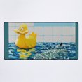 thumbnail image 1 of Una nueva alfombrilla de escritorio con un pato de goma y un tiburón pintados por Banksy, 1 of 1