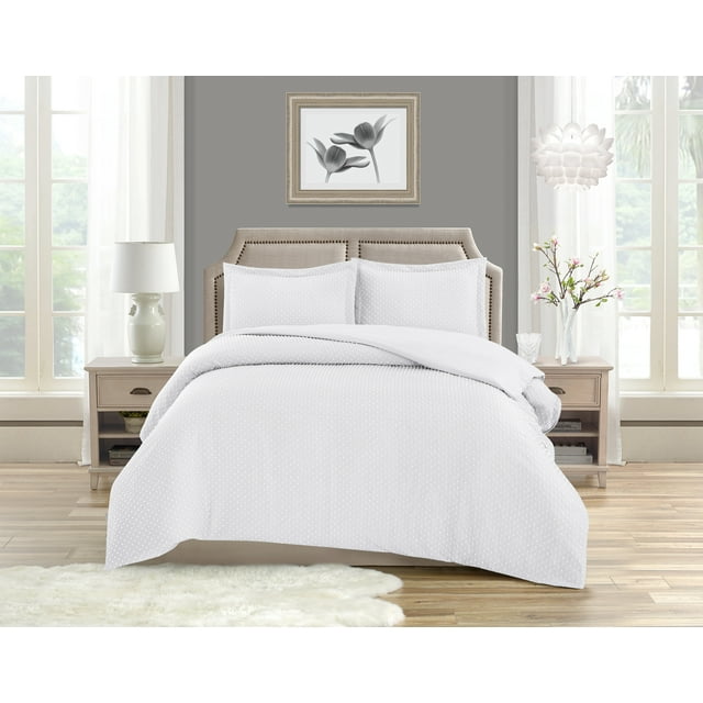 King size bed featuring Swift Home Dot Clip textured white duvet cover set with zipper closure, styled in a bright bedroom with neutral decor.