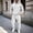 White, variant on Liuinsasek Men's 2 Piece Sweatpants Set Winter Solid-Color Hooded Long-Sleeve Sweatshirt and Pocketed Tapered Sweatpants Fashionable Casual Sportswear