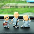 thumbnail image 2 of Figuras de acción de monjes budista, adornos de coche, decoración de monje, salpicadero Interior automotriz, accesorios de Voiture, regalos para niños, 2 of 3