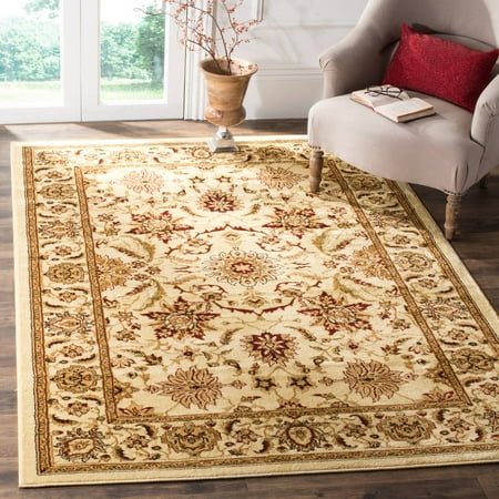 SAFAVIEH Lyndhurst Emma Traditional Area Rug  Ivory  9  x 12 Lyndhurst Rug Collection. Luxurious EZ Care Area Rugs. The Lyndhurst Collection features luxurious  easy care  easy-maintenance area rugs made to add long lasting charm and decorative beauty even in the busiest  high traffic areas of the home. Hand tufted using a blend of soft yet durable synthetic yarns styled in traditional Persian florals  interwoven vines and intricate latticework. Use the Lyndhurst rugs in your home for an elegant and transitional upgrade.