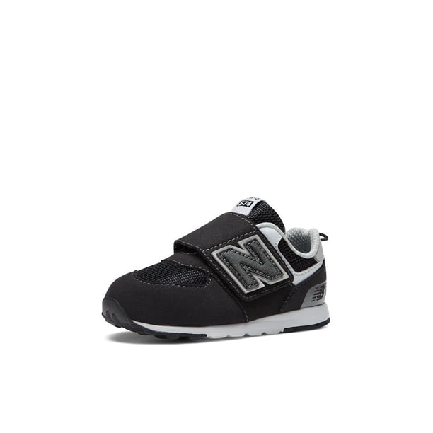 Zapatillas New Balance 574 V1 para bebés, color negro y plateado, con cierre de gancho