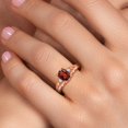 thumbnail image 4 of Gem Stone King 18K Rose Gold Plated Silver Red Garnet and White Moissanite 3 Stone Engagement Ring for Women | 1.58 Cttw | Oval 8X6MM | Round 2MM | Gemstone January Birthstone | Size 7, 4 of 6