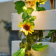 thumbnail image 1 of Guirnalda de luces solares con flores artificiales, 2m, 20 luces LED de glicina para fiesta, boda, jardín y habitación, 1 of 5