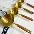 thumbnail image 5 of Everything Kitchens Modern Essentials Gold Measuring Cups with Wood Handles | Set of 4, 5 of 13