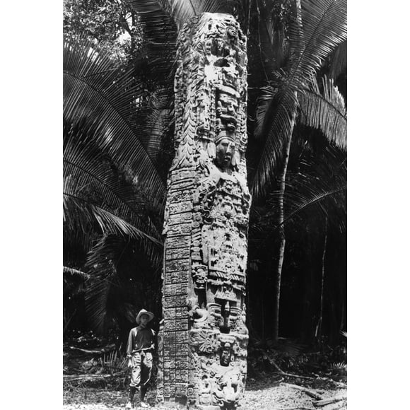 Guatemala: Quirigua, C1912. /Namerican Archaeologist Sylvanus G. Morley, Beside A Mayan Monument At Quirigua, Guatemala. Photograph, C1912. Poster Print by  (18 x 24)