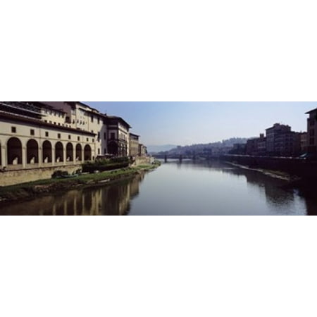 Buildings along a river Uffizi Museum Ponte Vecchio Arno River Florence Tuscany Italy Canvas Art - Panoramic Images (18 x
