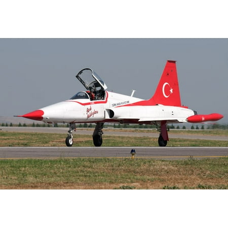 A NF-5A of the the Turkish Stars aerobatic display team Poster Print by Daniele FaccioliStocktrek