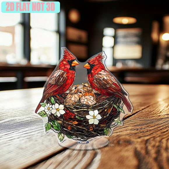 Revolving acrylic ornament featuring two vibrant Northern Cardinals in a mosaic nest with pastel chicks surrounded by emerald leaves and blossoms