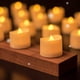thumbnail image 1 of Velas LED de Té Paquete 12 Pilas Amarillo Cálido Efecto Parpadeo para Decoración Hogar y Fiestas, 1 of 7