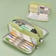 thumbnail image 1 of Estuche Grande Y Simple Para Lápices Con Capacidad Para Estudiantes De Secundaria Y Preparatoria, Para Niñas, Con Múltiples Funciones Y Tres Capas De Colores Macaron, 1 of 4