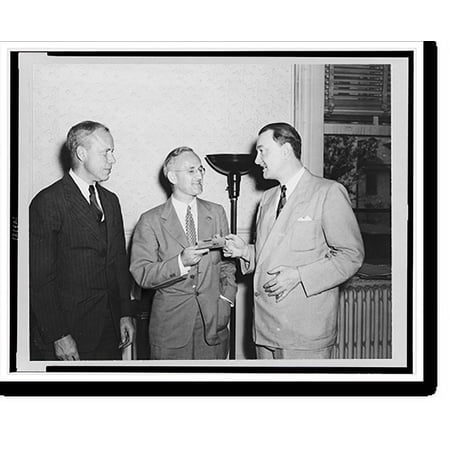 Historic Print [Laughlin Currie being presented with a silver cigarette case by two men on his retirement as president of the War Agencies Employees Protective Association] 18 x 24