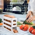 thumbnail image 4 of Soporte para huevos con desplazamiento automático de 4 niveles, soporte para huevos enrollable automático para refrigerador, almacenamiento de huevos alimentado por gravedad-Color blanco, 4 of 5