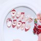 thumbnail image 4 of Uñas postizas acrílicas navideñas Sutaozhi de 30 piezas, forma almendra, 4 of 9