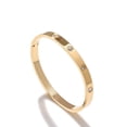 thumbnail image 1 of Brazalete de oro laminado con zirconias, 1 of 6