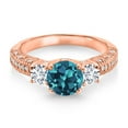 thumbnail image 2 of 18K Rose Gold Plated Silver London Blue Topaz White Lab Grown Diamond and White Moissanite Engagement Ring for Women (2.32 Cttw, Gemstone November Birthstone, Round 7MM and 4MM, Size 7), 2 of 3