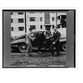 thumbnail image 2 of Historic Framed Print, Greenbelt, Maryland. Greenbelt men commute to Washington, alternately sharing each other's cars, 17-7/8" x 21-7/8", 2 of 9