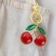 thumbnail image 4 of Llavero colgante Seplovoe con forma de cereza, de aleación con detalles de resina - Colgante para bolso y mochila en rojo o rosa, ideal para regalar, 4 of 6