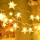 thumbnail image 1 of Guirnalda de luces de estrellas a pilas, 12 metros, 80 LED, ideal para el hogar, fiestas, Navidad, bodas y decoración de jardín, blanco cálido., 1 of 5