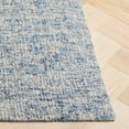 thumbnail image 4 of SAFAVIEH Abstract Carina Solid Area Rug, Blue/Ivory, 8' x 10', 4 of 11