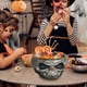 thumbnail image 3 of Uuiauoio Halloween Candy Bowl Dish with Hand Spooky Animated Pumpkin Decoration Props LED Eyes & Sound for Treat or Trick Haunted House Office Party Bar Table Decor, 3 of 5