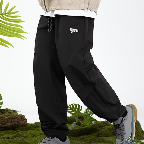 Pantalones largos para hombre, estilo exterior, a la moda, impermeables, lisos, informales, con cintura elástica y bolsillos, pantalones cargo para hombre.