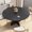black, variant on Round Pedestal Dining Table with Mark-Resistant Top, Adjustable Feet, Space-Saving Design