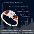 thumbnail image 2 of Gem Stone King 10K Yellow Gold Red Created Ruby White Moissanite and Diamond Accent 3-Stone Engagement Ring for Women | 1.92 Cttw | Wedding Engagement Anniversary Promise Ring for Women | Size 5, 2 of 5