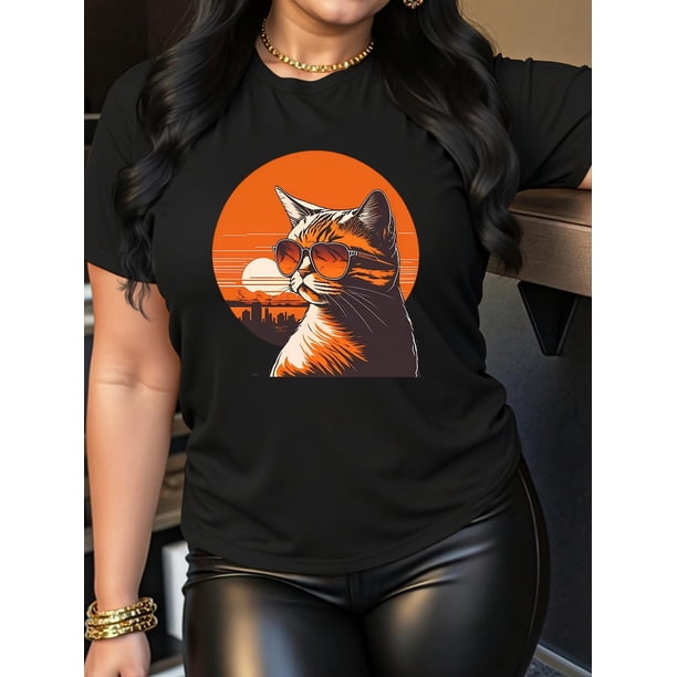 A Casual Fashion Top with a Round Neck And Short Sleeves Featuring a Sunset Print of a Little Cat And a Black Woman.