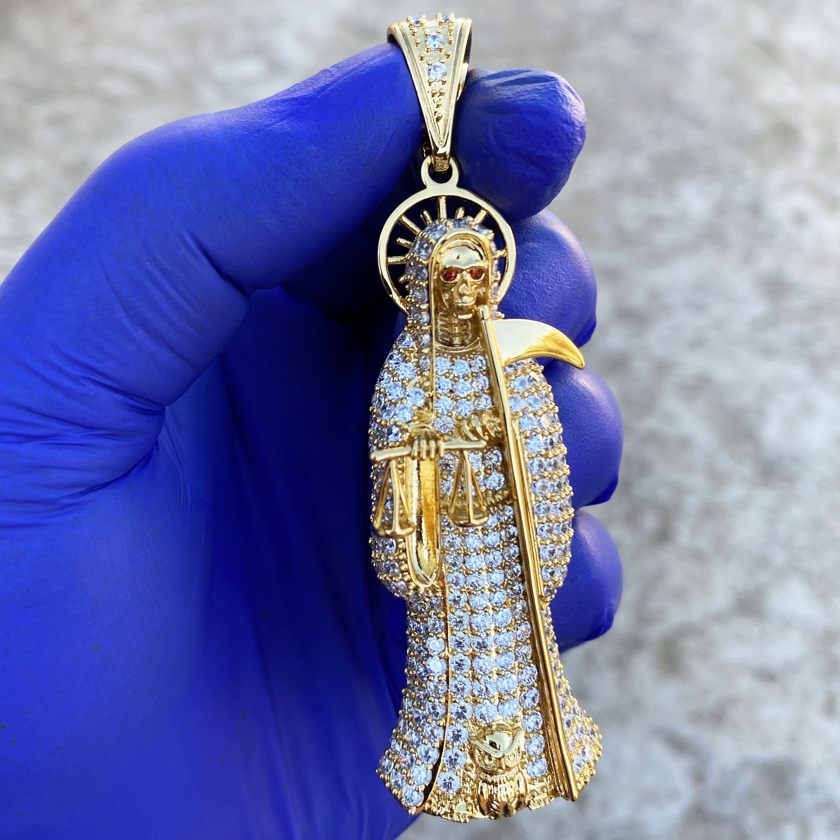 Gold santa muerte pendant deals