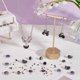 thumbnail image 4 of Aproximadamente 529 piezas de kits de cuentas con forma de estrella y luna, espaciadores de vidrio surtidos, cuentas estéticas para pulseras, collares, colgantes y aretes, serie morado oscuro., 4 of 9